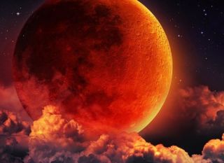 Fenomene astronomice simultane: Planeta Marte şi Luna „sângerie“